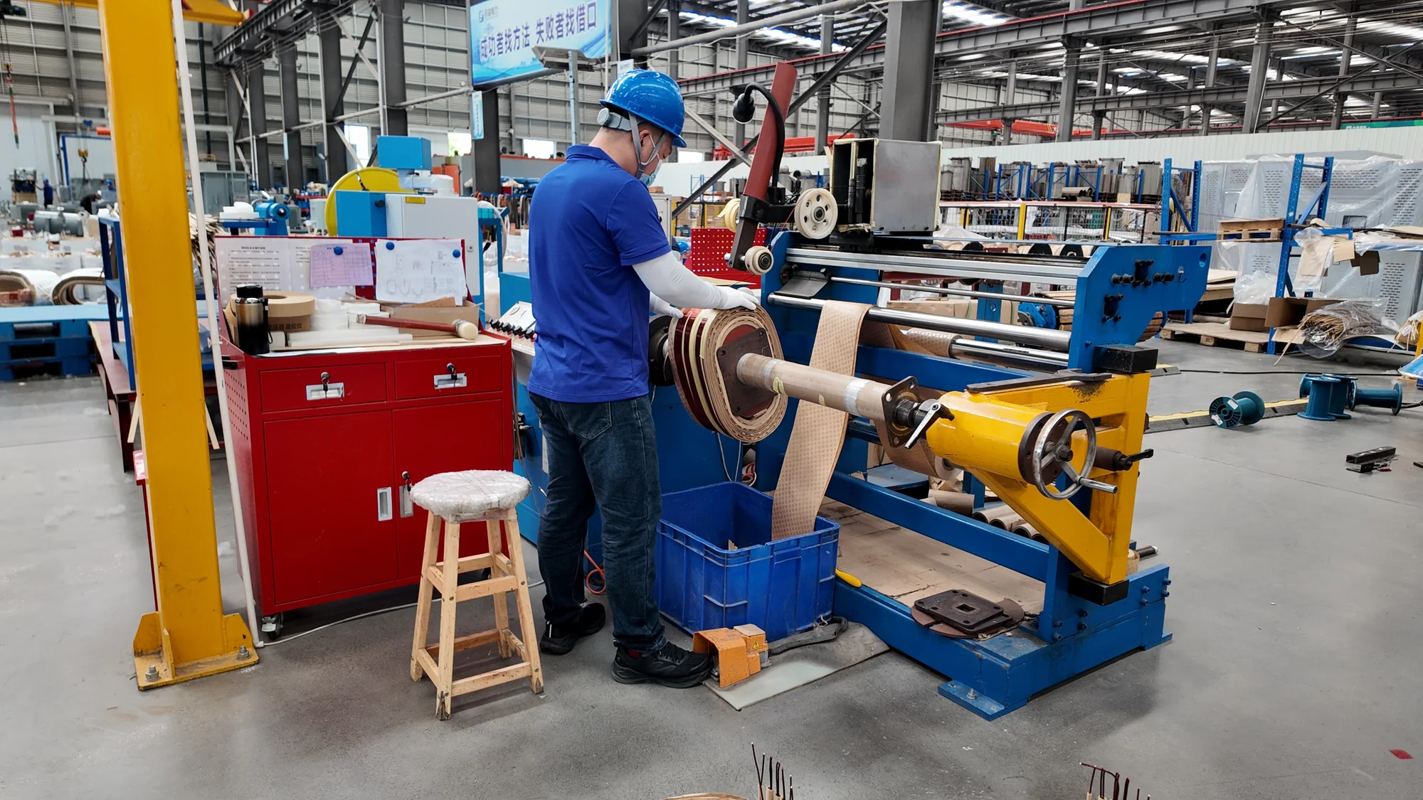 Technician carrying out transformer winding work